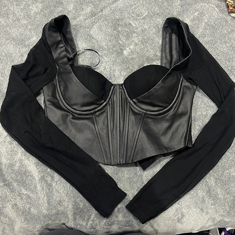 Leather corset top with mesh sleeeves